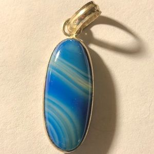 Sterling silver pendant with blue swirled stone